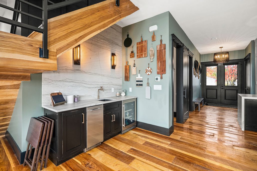 Wet bar in the kitchen is Sea Pearl leathered quartzite.